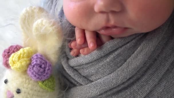 Cute Newborn Baby Girl Sleeping Swaddled Fabric Wearing Hat — Stock Video