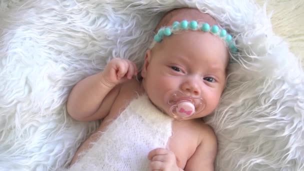 Slow Motion Innocent Newborn Angel White Knitted Suit — Stockvideo