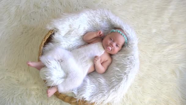 Adorable Newborn Baby Girl Sleeping Tiny Basket Fur Wearing Knitted — Stock Video