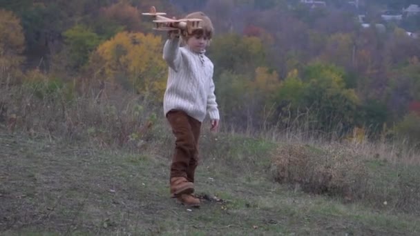 Happy Kid Playing Pilot Helmet Pretend Aviator — Stockvideo
