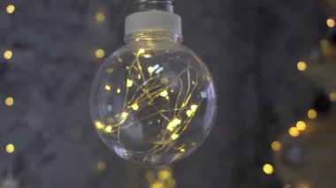 4K Noel çelengi parlayan ampuller şeklinde. Yeni yıl için dekorasyon