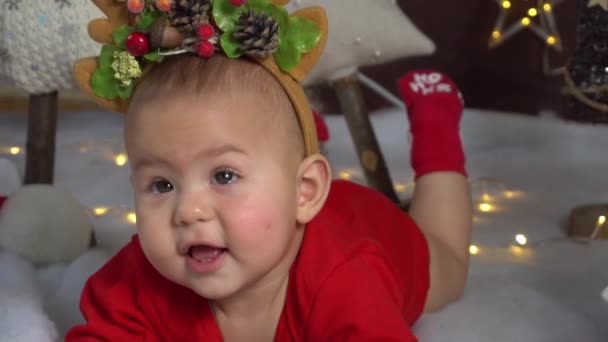 Slow Motion Little Baby Wearing Funny Deer Antlers Indoors First — Stock Video
