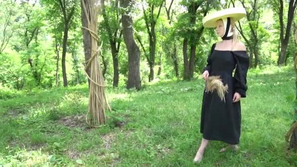 Woman Straw Hat Black Dress Poses Background Trees — Stock Video