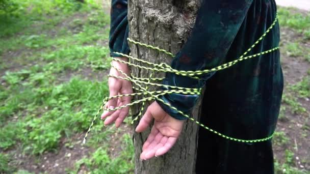 Slow Motion Restraint Women Concept Woman Her Hands Tied Tree — Stock Video