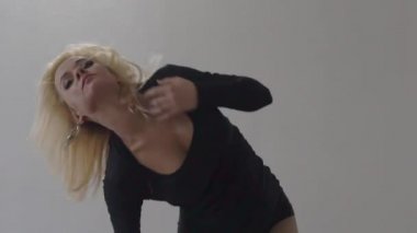 Slow Motion girl dancer in a black bodysuit