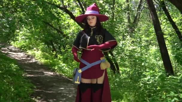 Slow Motion Girl Wearing Fantasy Witch Costume Casting Spell — Stockvideo