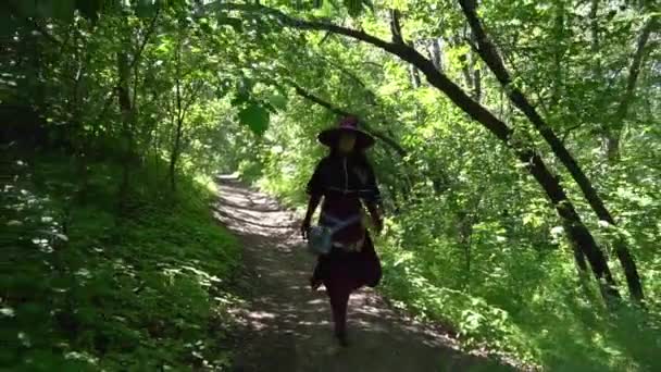 Girl Wearing Fantasy Witch Costume Walking Forest — Stockvideo