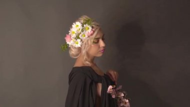 Slow Motion Perfect Young Model with Flowers on Head posing