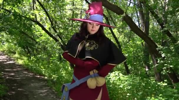 Slow Motion Young Woman Witch Costume Hat Looking Mysteriously — Stockvideo