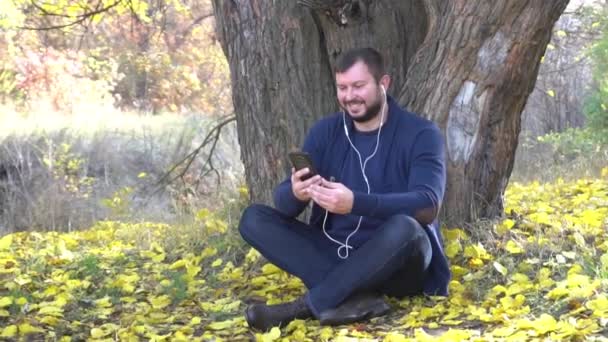 Middle Aged Man Online Video Call Autumn Park — Vídeo de stock