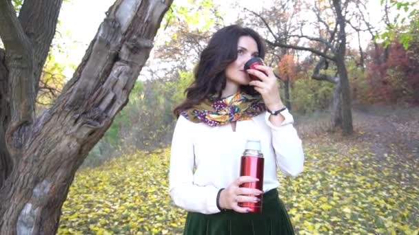 Slow Motion Beautiful Woman Relaxing Drinking Coffee Autumn Garden — Stockvideo