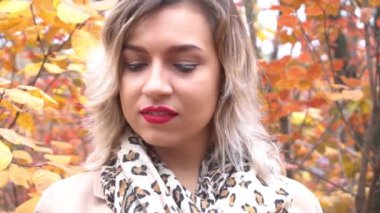 Slow Motion pretty autumn girl in the yellow park alone