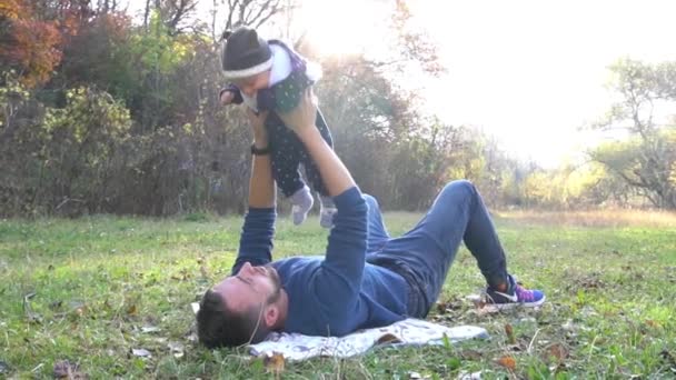 Slow Motion Young Dad Playing Son Autumn Outdoor — Video