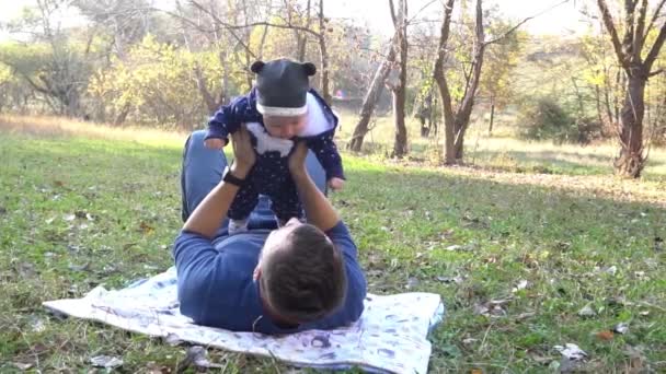 Slow Motion Dad Holding Small Child Son Boy Fall Nature — Video Stock