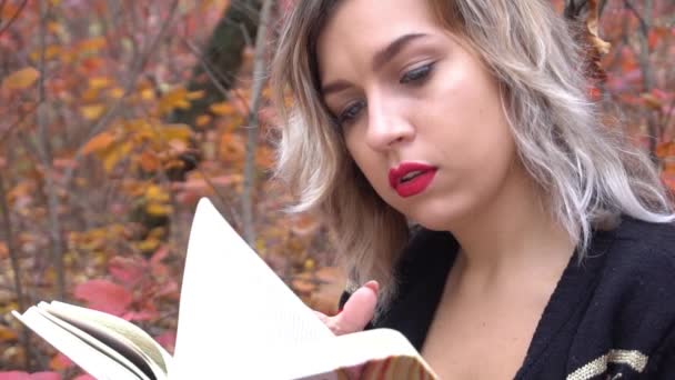 Slow Motion Girl Reading Book Autumn Park — Stock videók
