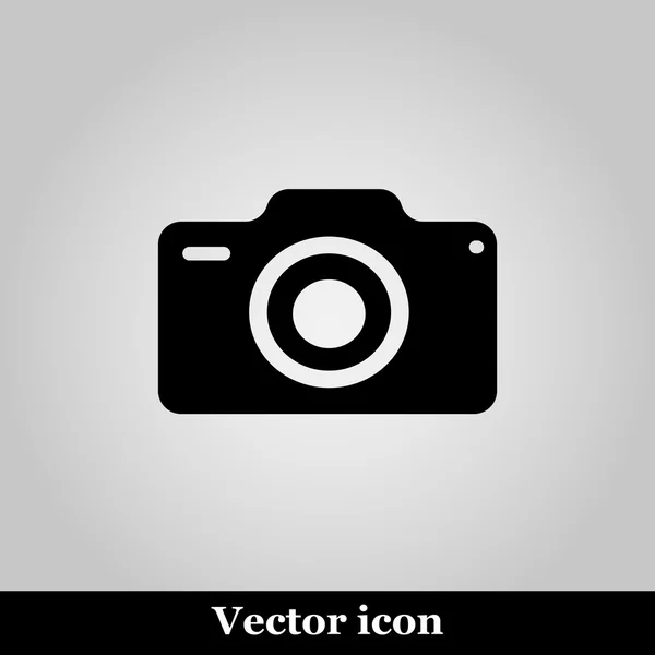 Icono de la cámara fotográfica sobre fondo gris, ilustración vectorial — Vector de stock