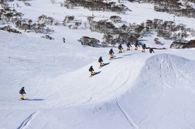 Skier racing through a Ski Cross Course in Australia clipart