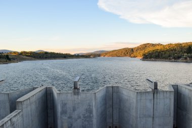 Weighted flood gates on Jindabyne Dam, confining the Snowy River clipart