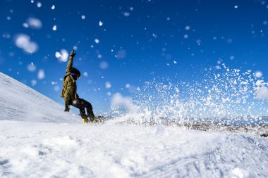 Snowboarder racing through a Cross Course in Australia clipart