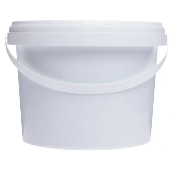 Small plastic white bucket. Construction bucket with a handle. The back of the bucket. — Stock Photo, Image