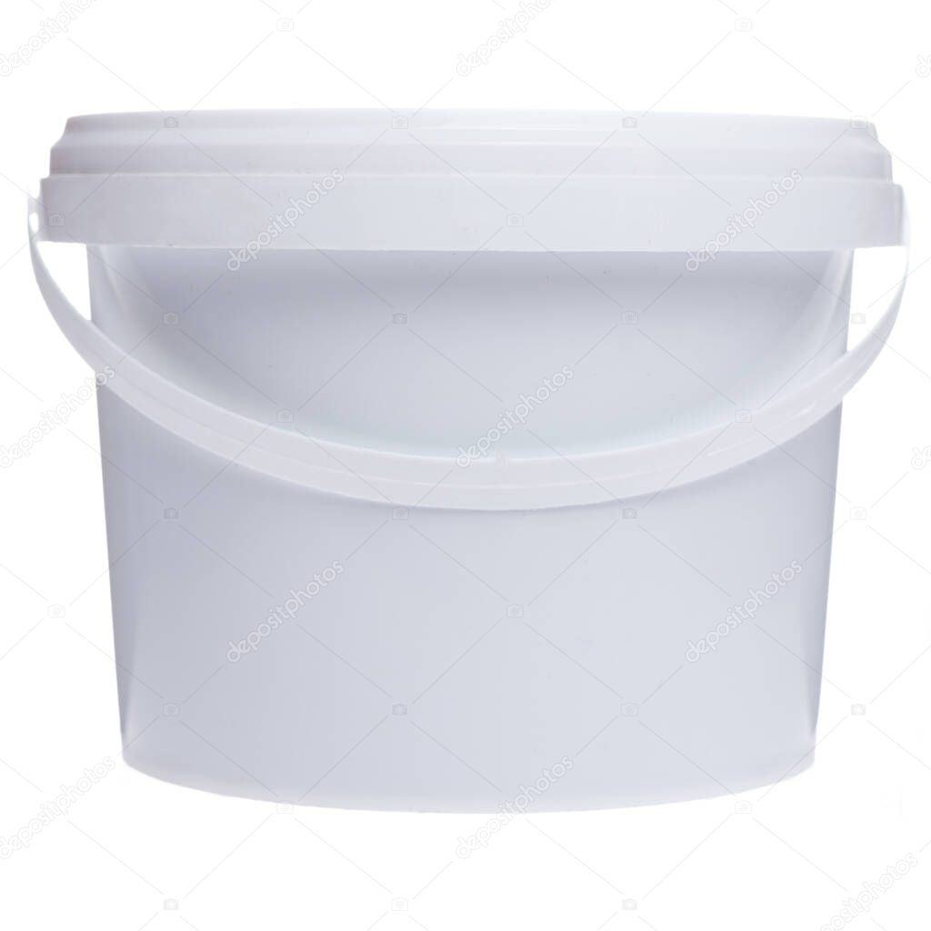 Small plastic white bucket. Construction bucket with a handle. The back of the bucket.