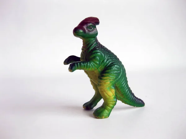 Toy dinosaurs on white background.