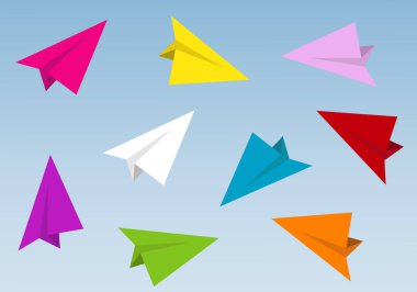 Damgalı renkli kağıt uçaklar. Origami