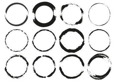 Beyaz arkaplanda fırça darbeleri çemberi.