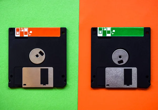 Floppy Disks Green Orange Background — Stock Photo, Image