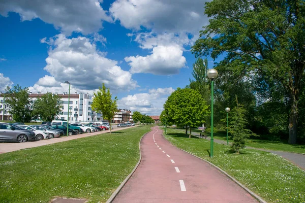 Walk for pedestrians and bike path near an urbanization