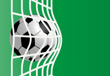 Yeşil zemin üzerinde futbol topu.