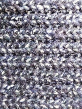 Kalın bir yün örgü dokusunun yakın çekimi