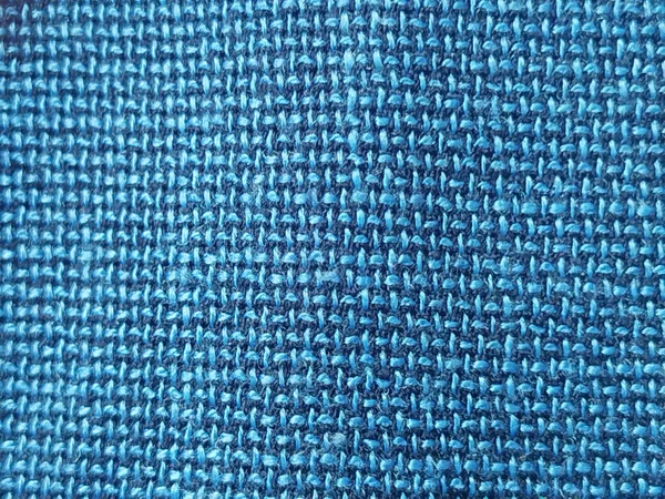 Koyu mavi dokuma kumaş dokusu arkaplanı lif detaylarıyla