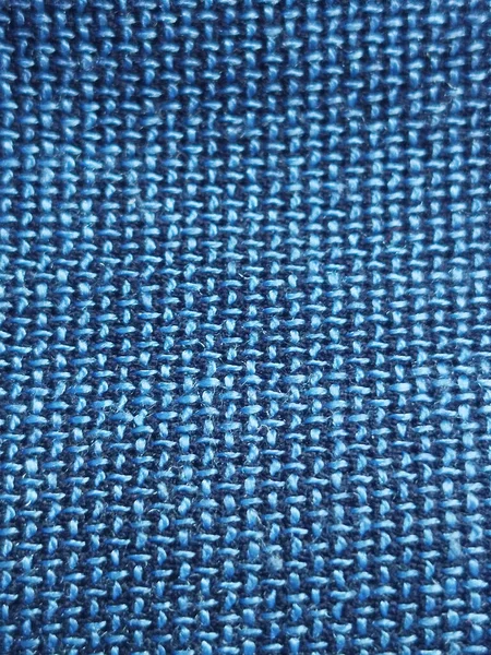 Turkuaz mavi ipliklerle örülmüş kumaşın arkaplan dokusu