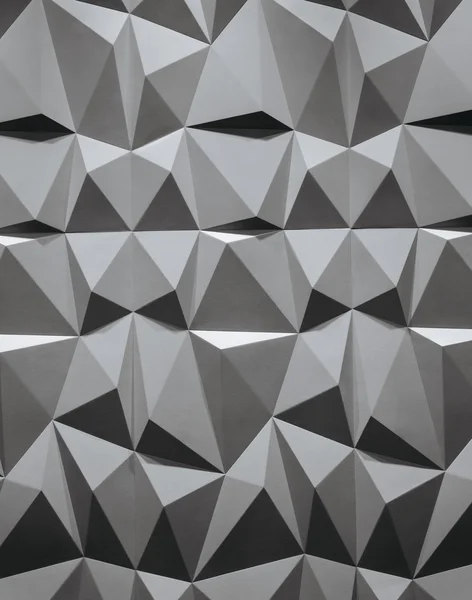 abstract wallpaper or geometrical background consisting of black and white geometric shapes: triangles and polygons