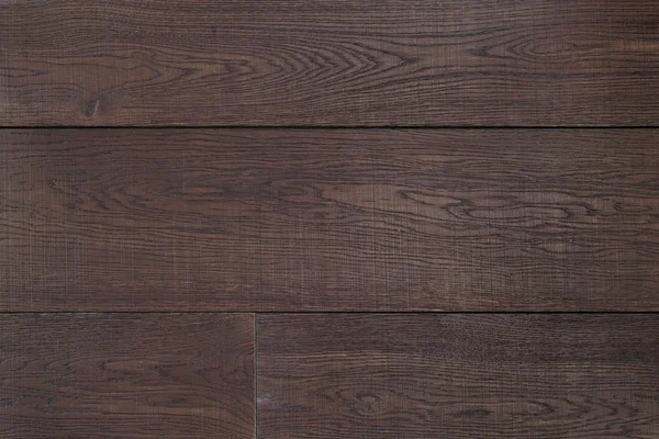 Doku soyut doku arka plan, üstten görünüm olarak koyu kahverengi parke. Malzeme ahşap, meşe, akçaağaç