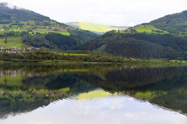 Vangsvatnet mirror lake in Voss. clipart