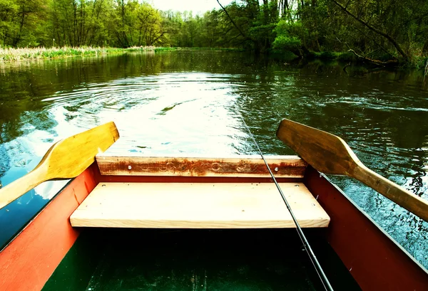 Inside of boat view with fishing rod — Stock Photo, Image