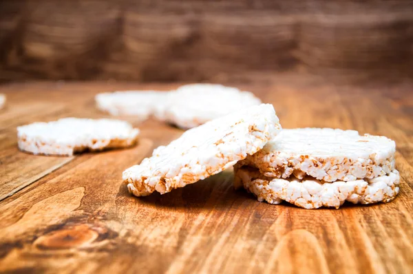 Rice waffles on wooden table