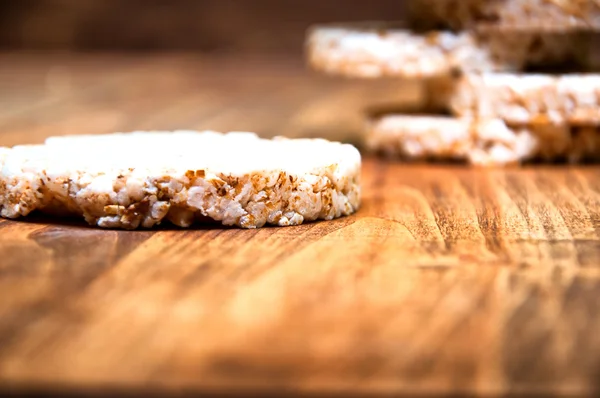 Rice waffles on wooden table