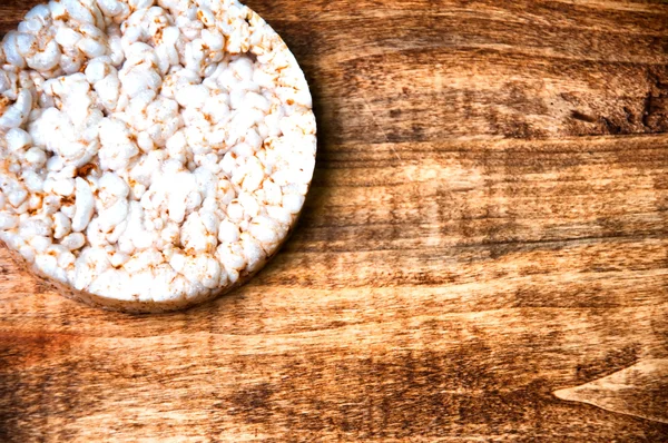 Rice waffles on wooden table