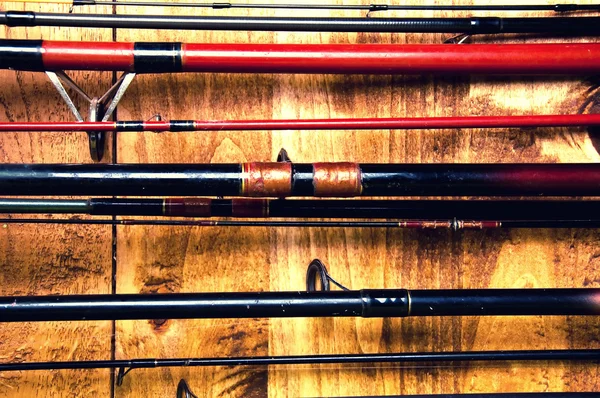 Cañas de pescar apiladas en líneas —  Fotos de Stock