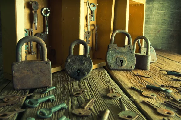 Boxes with old keys and padlocks — Stock Photo, Image