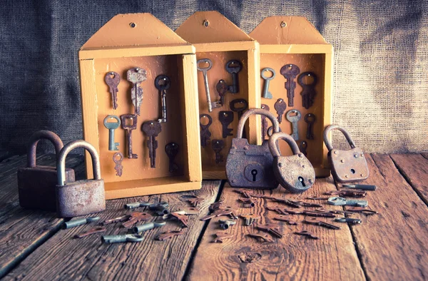 Boxes with old keys and padlocks — Stock Photo, Image