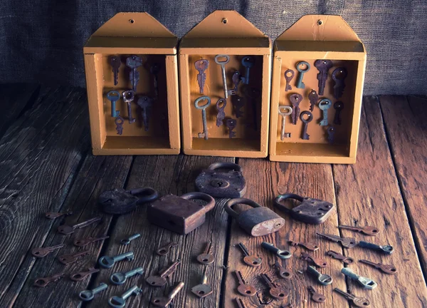 Boxes with old keys and padlocks — Stock Photo, Image