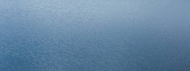 Mavi deniz suyu yüzey arkaplanının dokusu