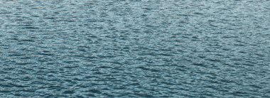 Mavi deniz suyu yüzey arkaplanının dokusu