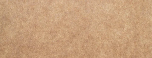 在白色背景上隔离的旧的褐色砂纸 — 图库照片