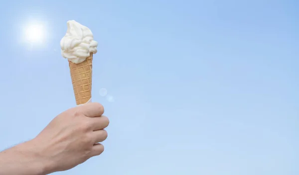 soft ice cream cone on blue sky