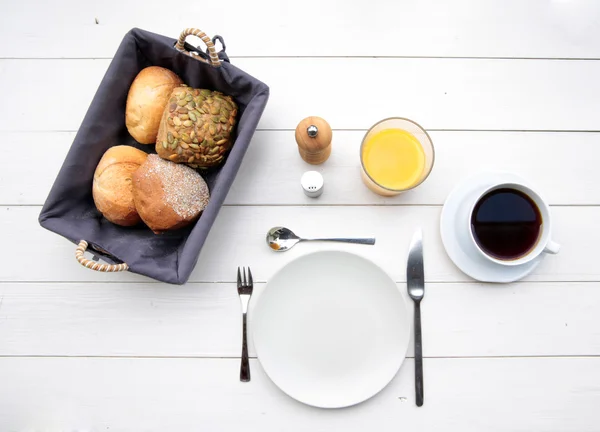 Delicate breakfast at a white table — Stock Photo, Image